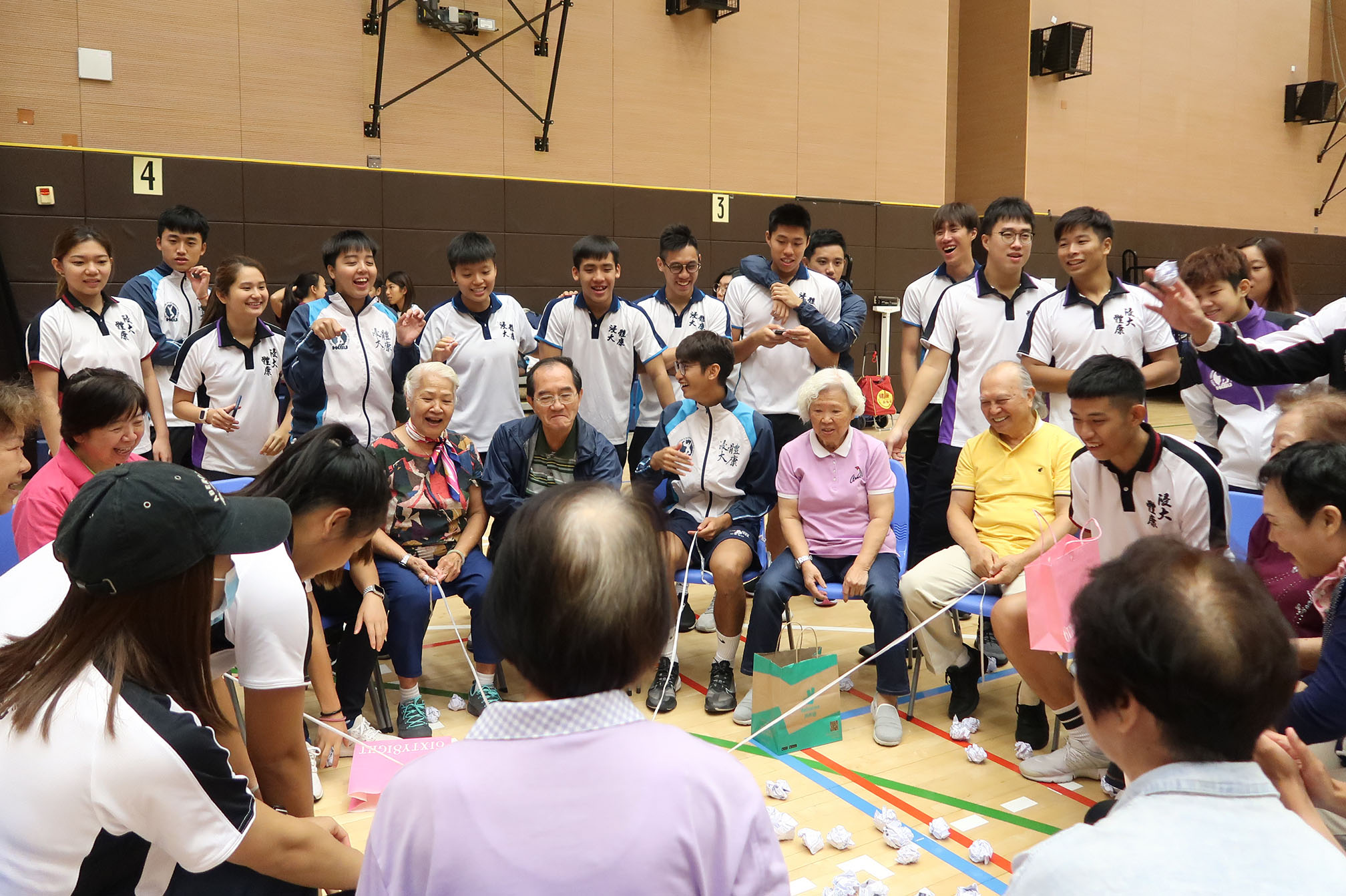 Students from the Department of Sport, Physical Education and Health design games to play and engage with the elderly.